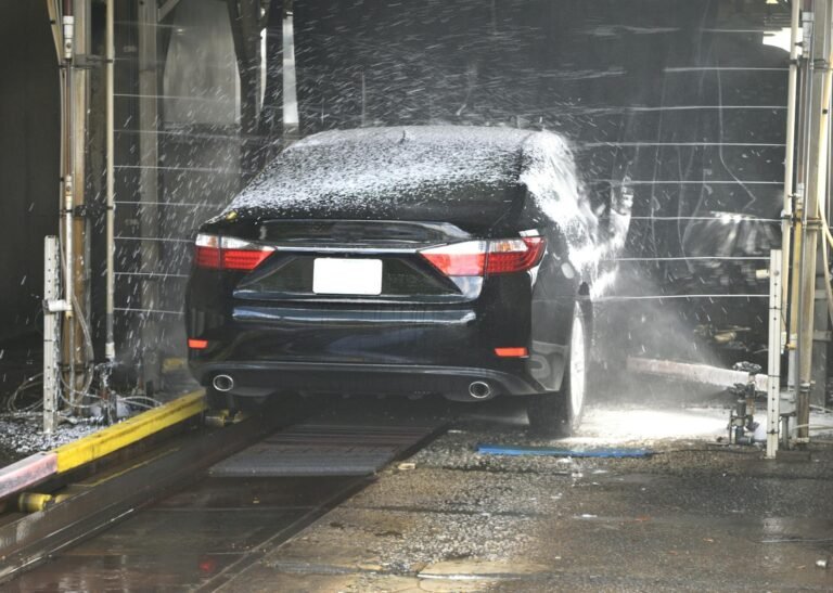 carwashed black sedan