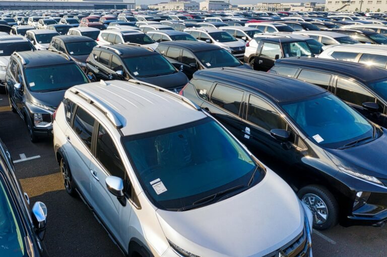 contemporary new cars of manufacture in daytime